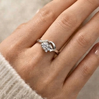 The Furl — Moissanite Ring with a Folded Ribbon Shoulder